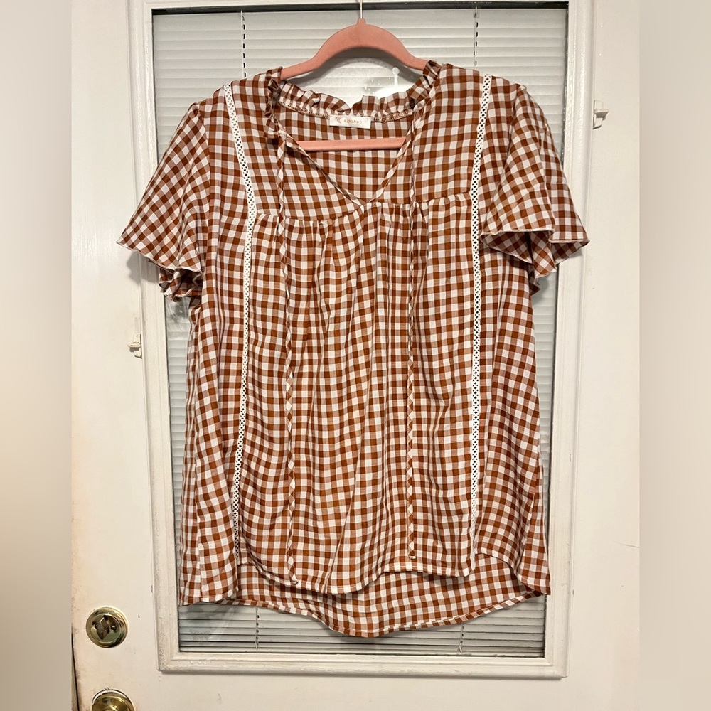 Burnt orange and white top